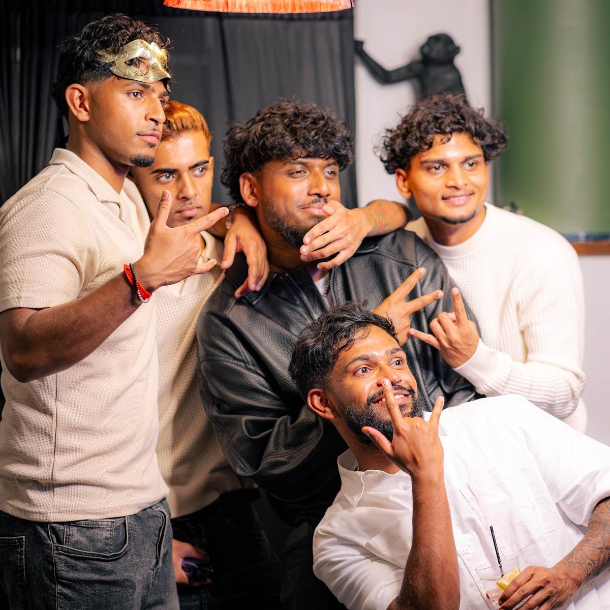 Guests posing inside the Manjal photo booth